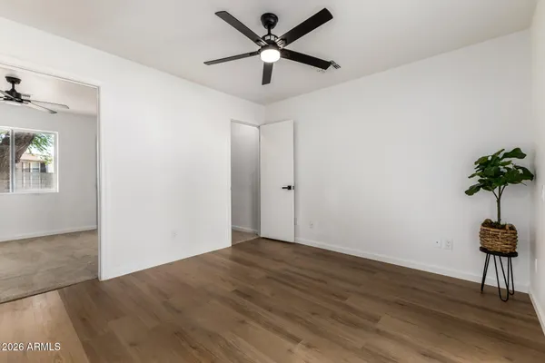 a view of empty room with windows