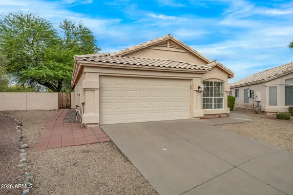 front view of a house with a street
