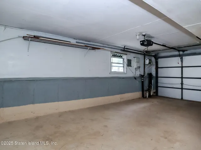 a view of a house with a yard and deck