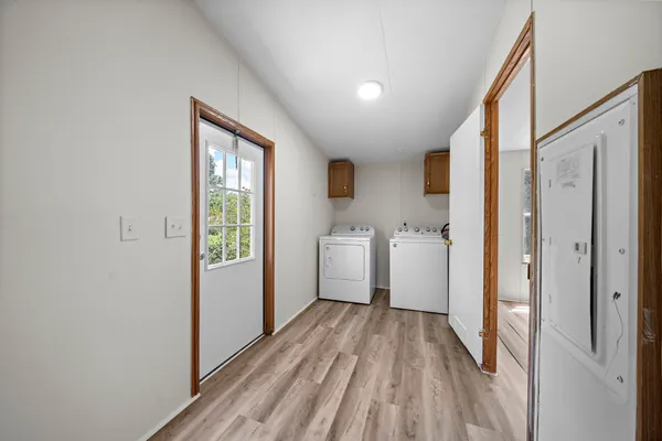 a view of a bathroom with a sink and a window