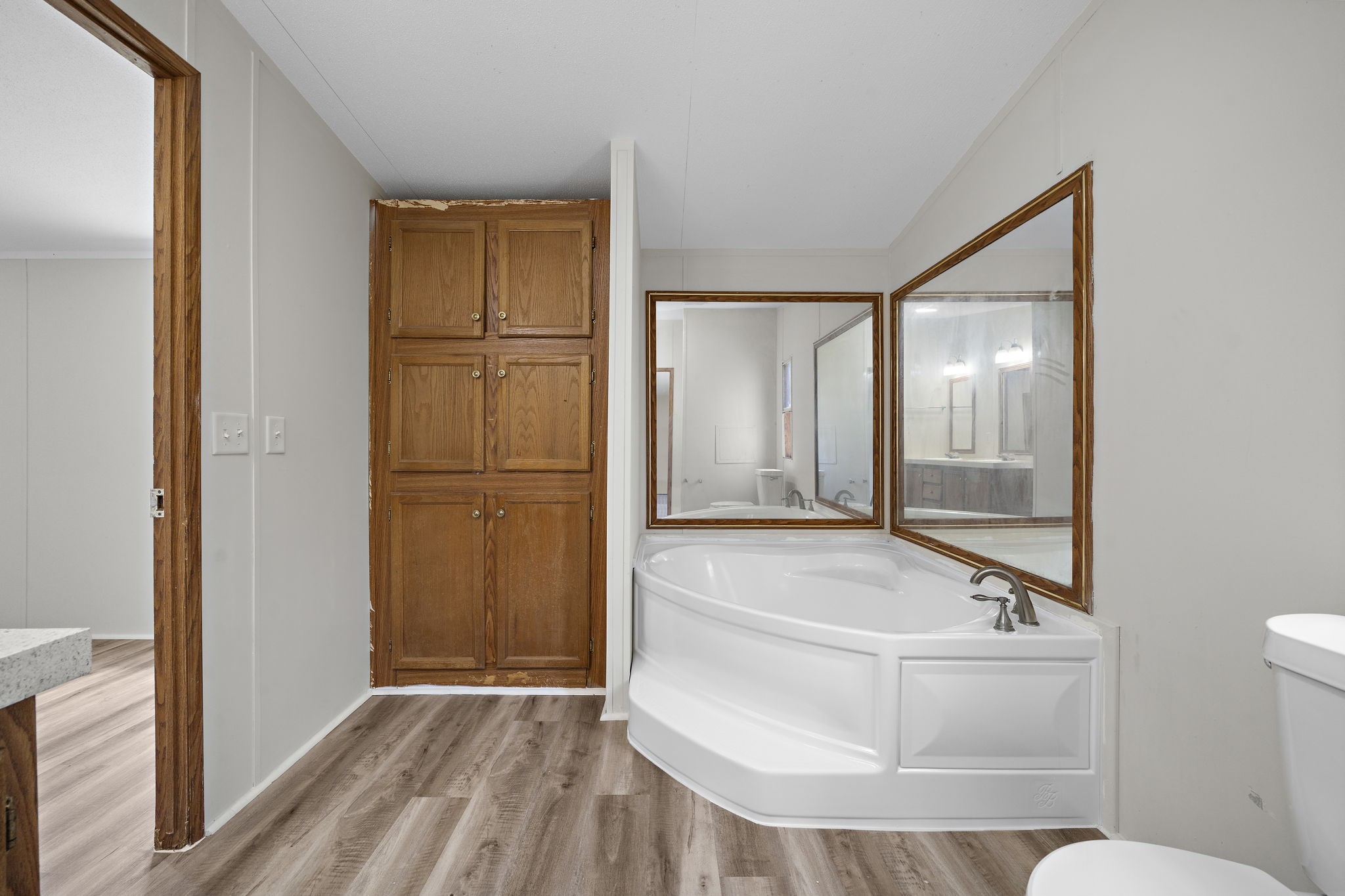 16482 Pisces Road Conroe, TX 77306 - Photo 23 of 35 a bathroom with a tub and shower