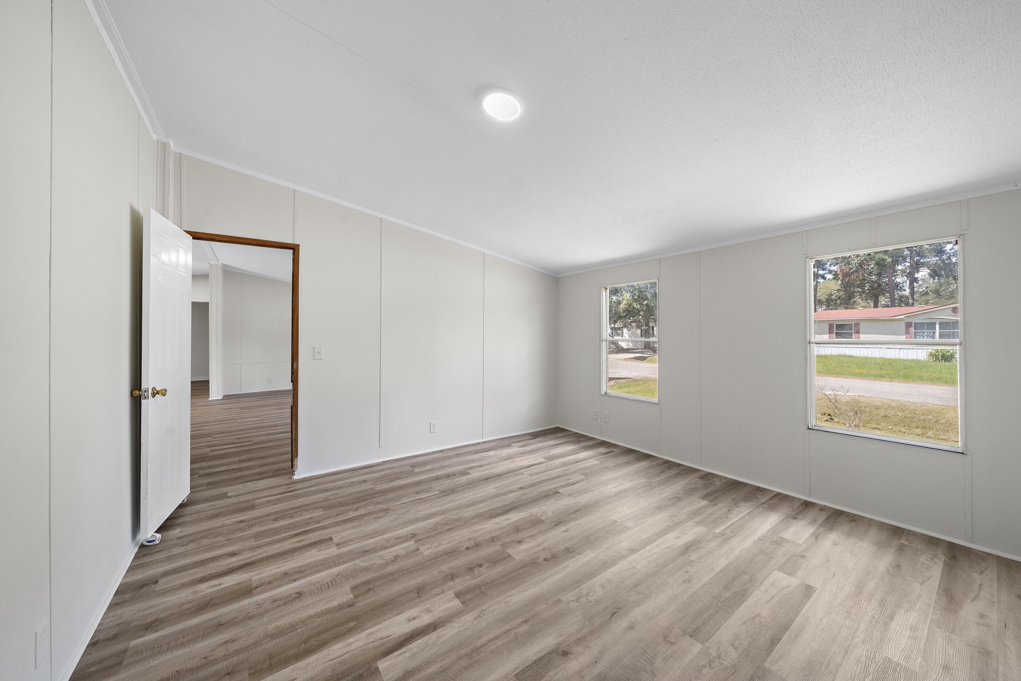 16482 Pisces Road Conroe, TX 77306 - Photo 24 of 35 a view of an empty room and window