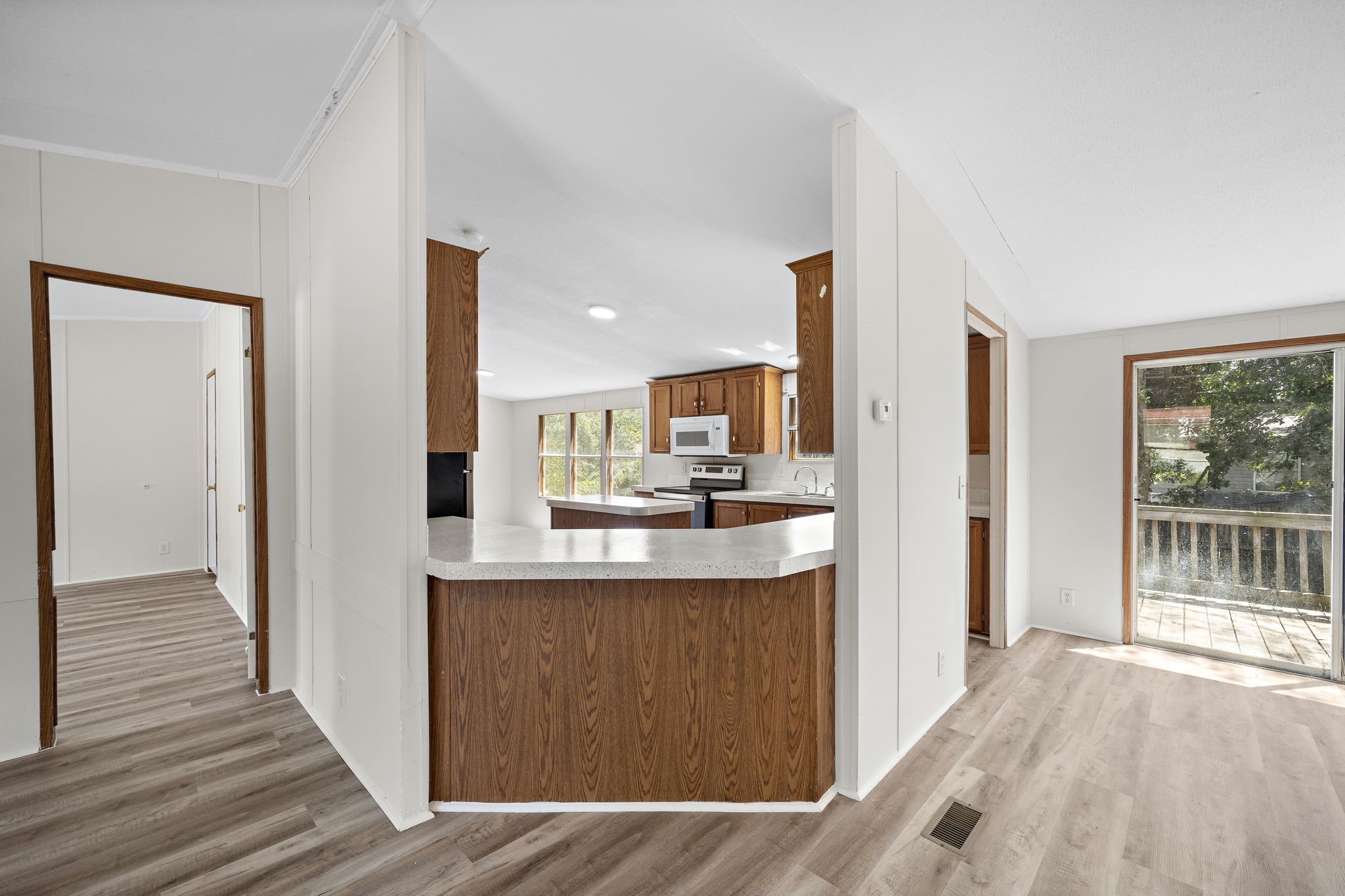 16482 Pisces Road Conroe, TX 77306 - Photo 10 of 35 a view of kitchen with wooden floor