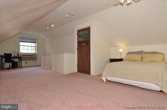 1807 Myrtle Road Silver Spring, MD 20902 - Photo 16 of 27 a bedroom with a bed and a night stand