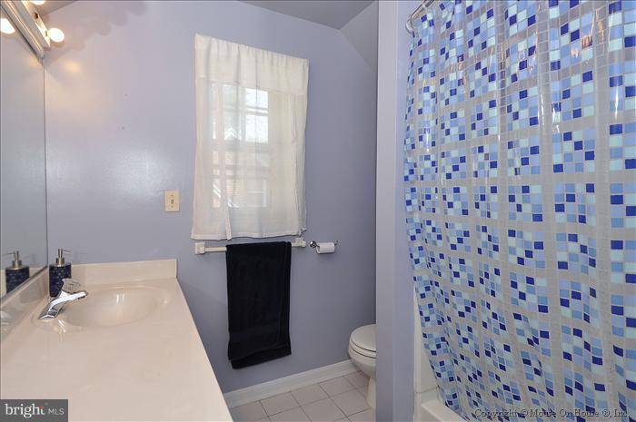 1807 Myrtle Road Silver Spring, MD 20902 - Photo 18 of 27 a bathroom with a sink a toilet and a shower