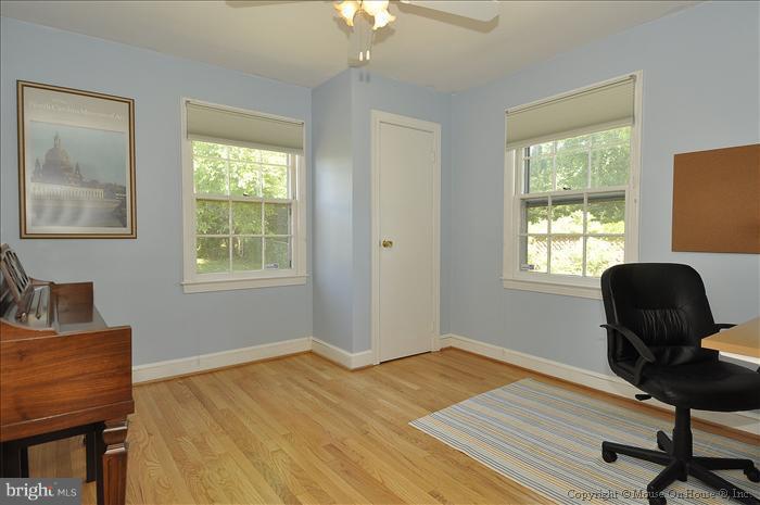 1807 Myrtle Road Silver Spring, MD 20902 - Photo 20 of 27 a workspace with furniture and a window