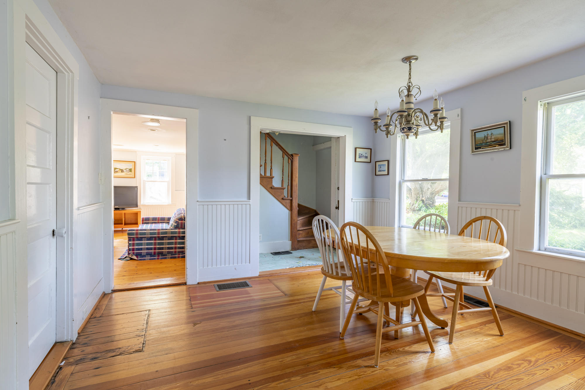 77 Queen Anne Road Chatham, MA 02633 - Photo 18 of 28 a view of a dining room with furniture window and wooden floor
