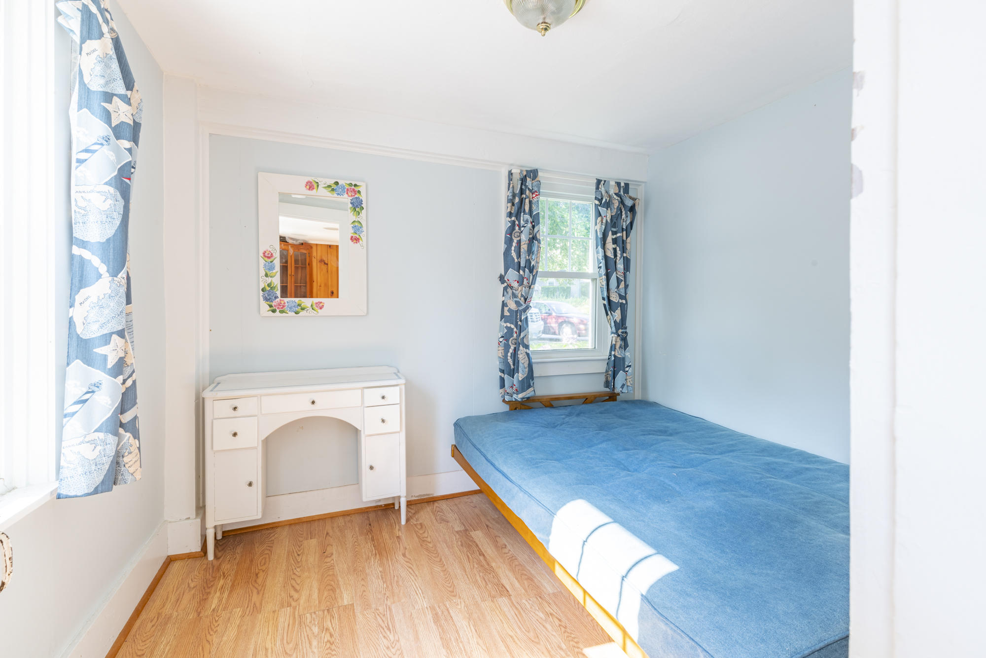 77 Queen Anne Road Chatham, MA 02633 - Photo 23 of 28 a view of empty room with a fireplace and wooden floor