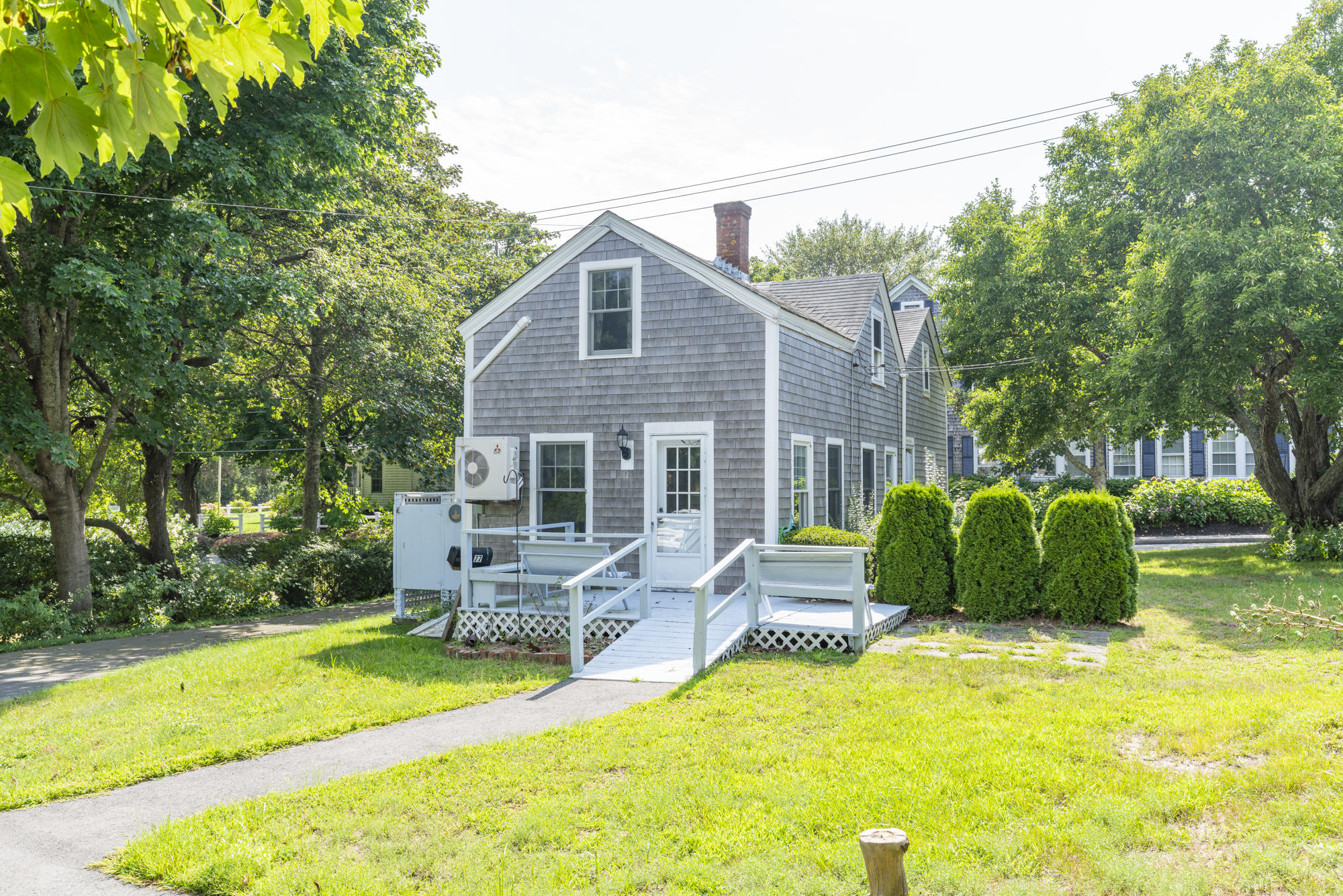 77 Queen Anne Road Chatham, MA 02633 - Photo 9 of 28 a view of a house with a backyard