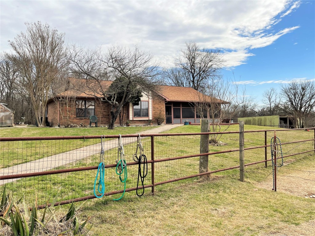 5001 Blue Bluff Road Austin, TX 78724 - Photo 8 of 28 a view of a house with a yard