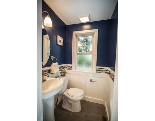 1350 Plumtree Road Springfield, MA 01119 - Photo 4 of 11 a bathroom with a toilet a sink and mirror
