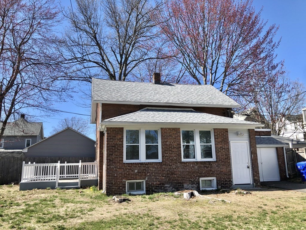 16 Sullivan Street Springfield, MA 01104 - Photo 22 of 25 a front view of a house with a yard