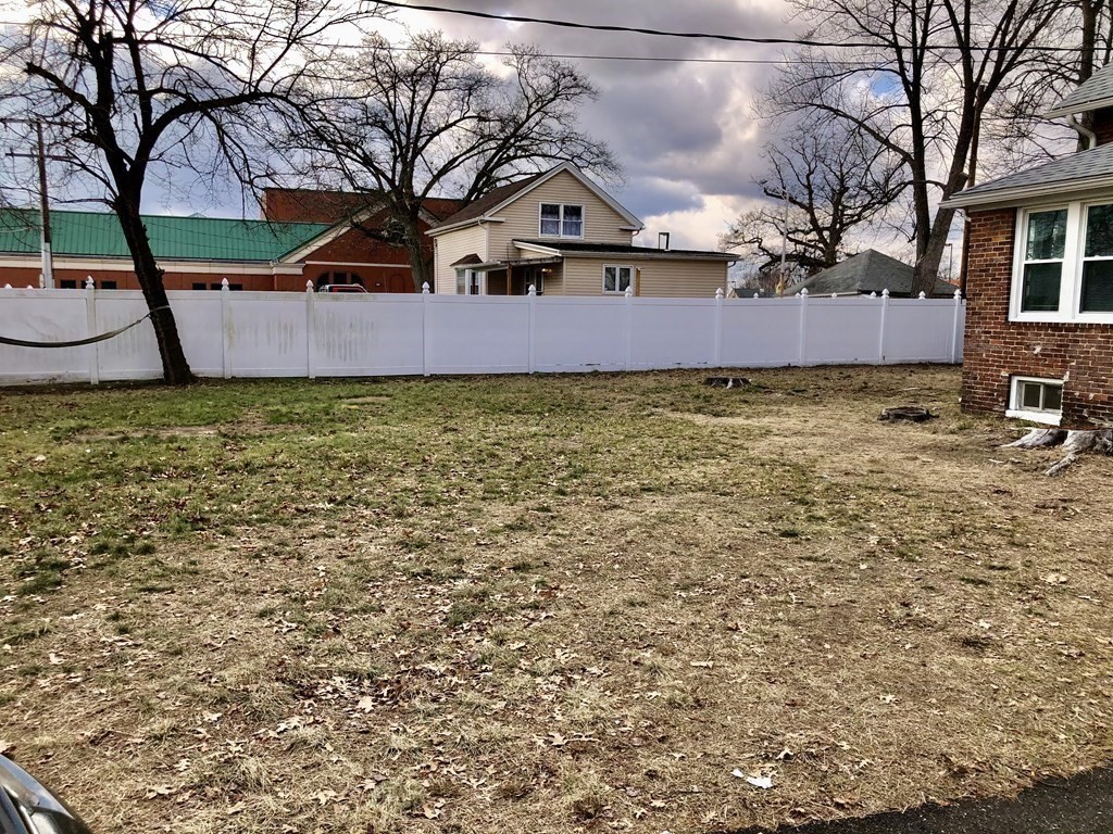 16 Sullivan Street Springfield, MA 01104 - Photo 23 of 25 a front view of a house with garden