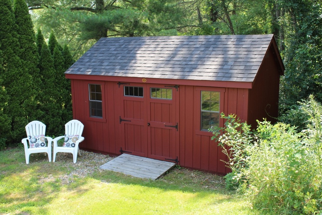 713 Wheelwright Road Barre, MA 01005 - Photo 7 of 18 a backyard of a house with table and chairs