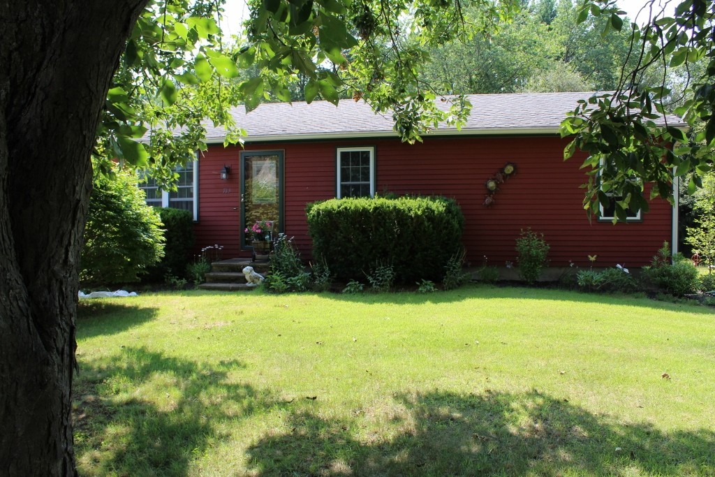 713 Wheelwright Road Barre, MA 01005 - Photo 8 of 18 a front view of a house with a yard