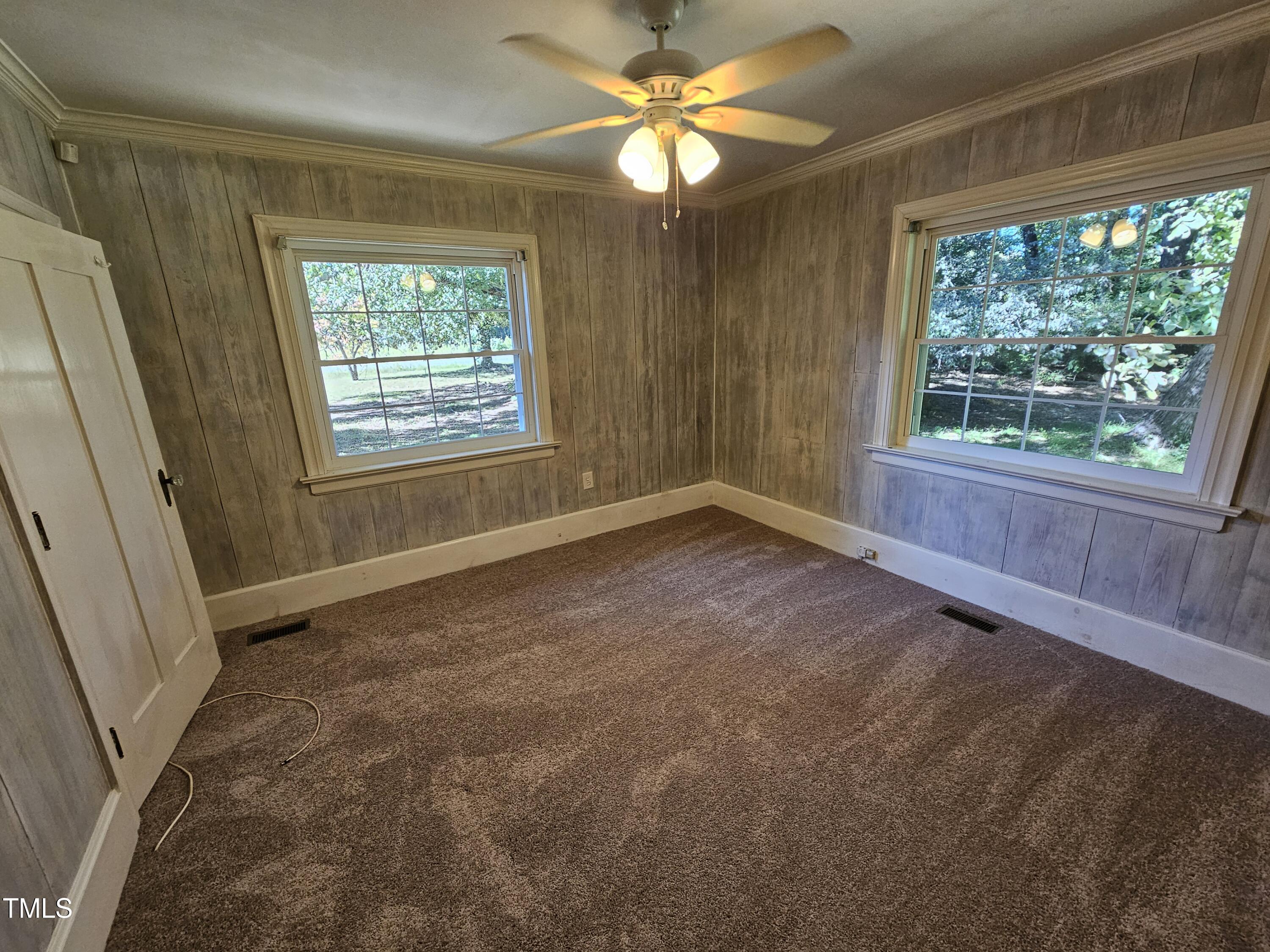 8178 Highway 751 Durham, NC 27713 - Photo 15 of 20 a view of an empty room with a window