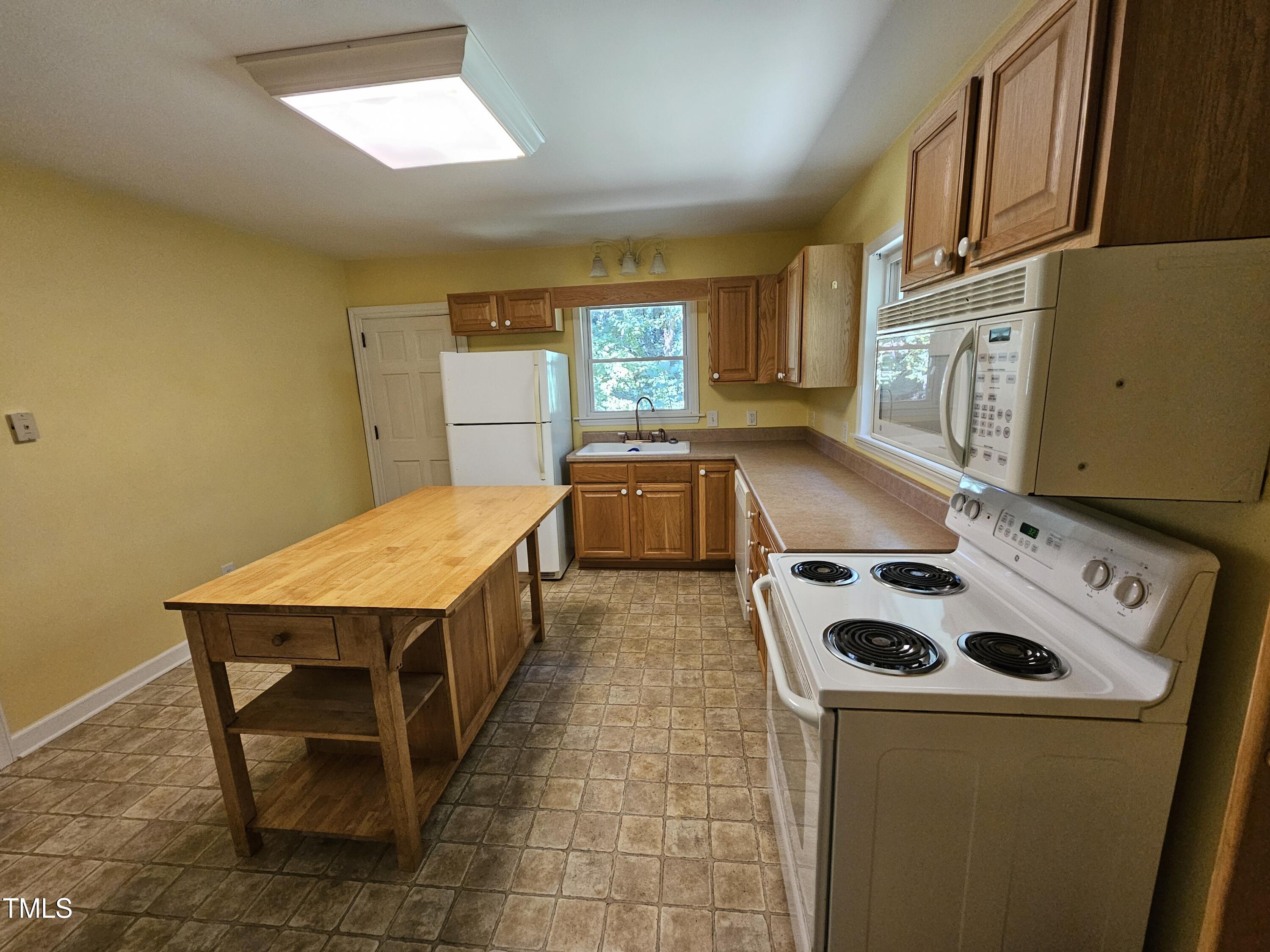 8178 Highway 751 Durham, NC 27713 - Photo 20 of 20 a room with storage and utility