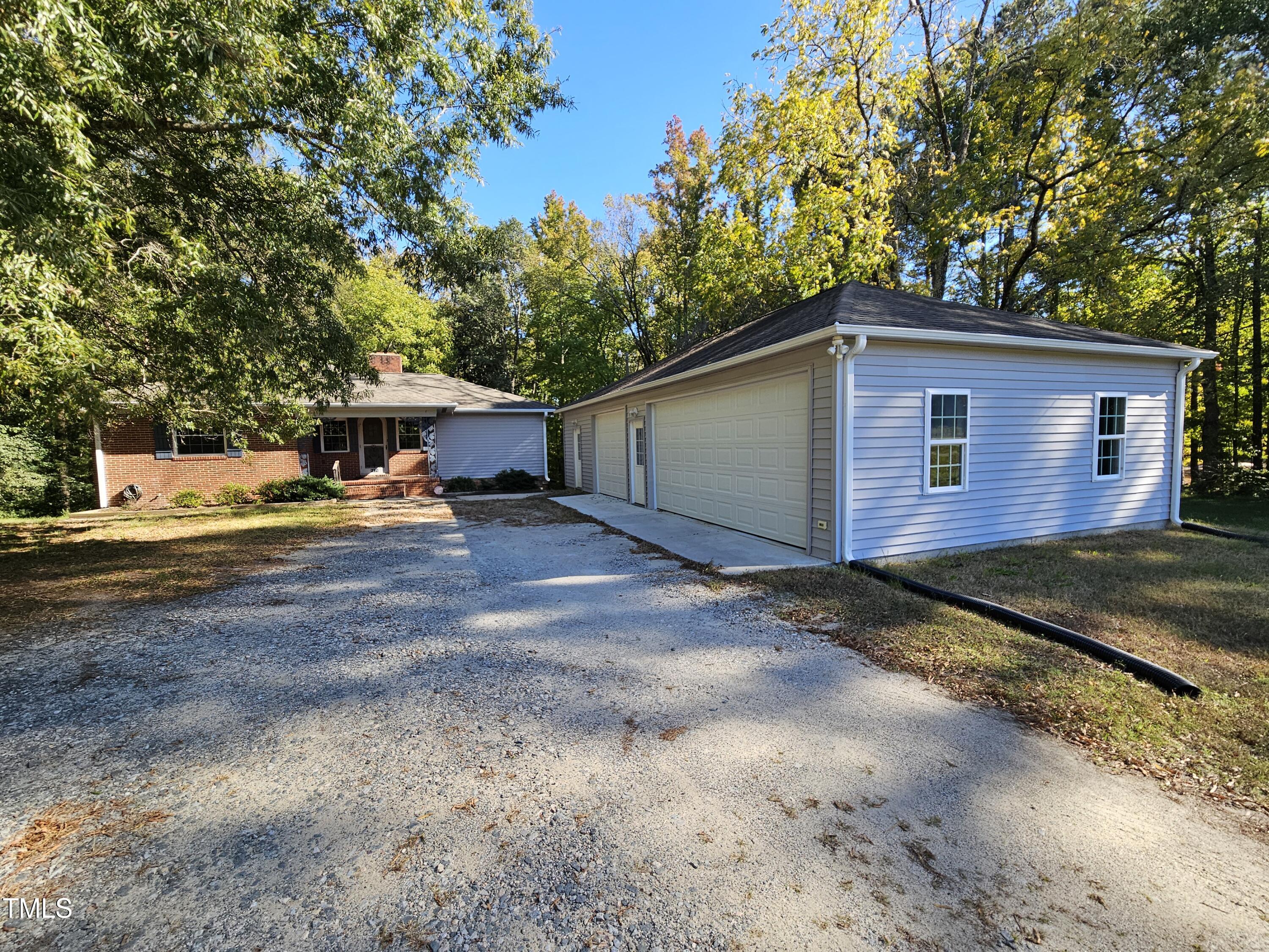 8178 Highway 751 Durham, NC 27713 - Photo 2 of 20 a view of a house with a yard