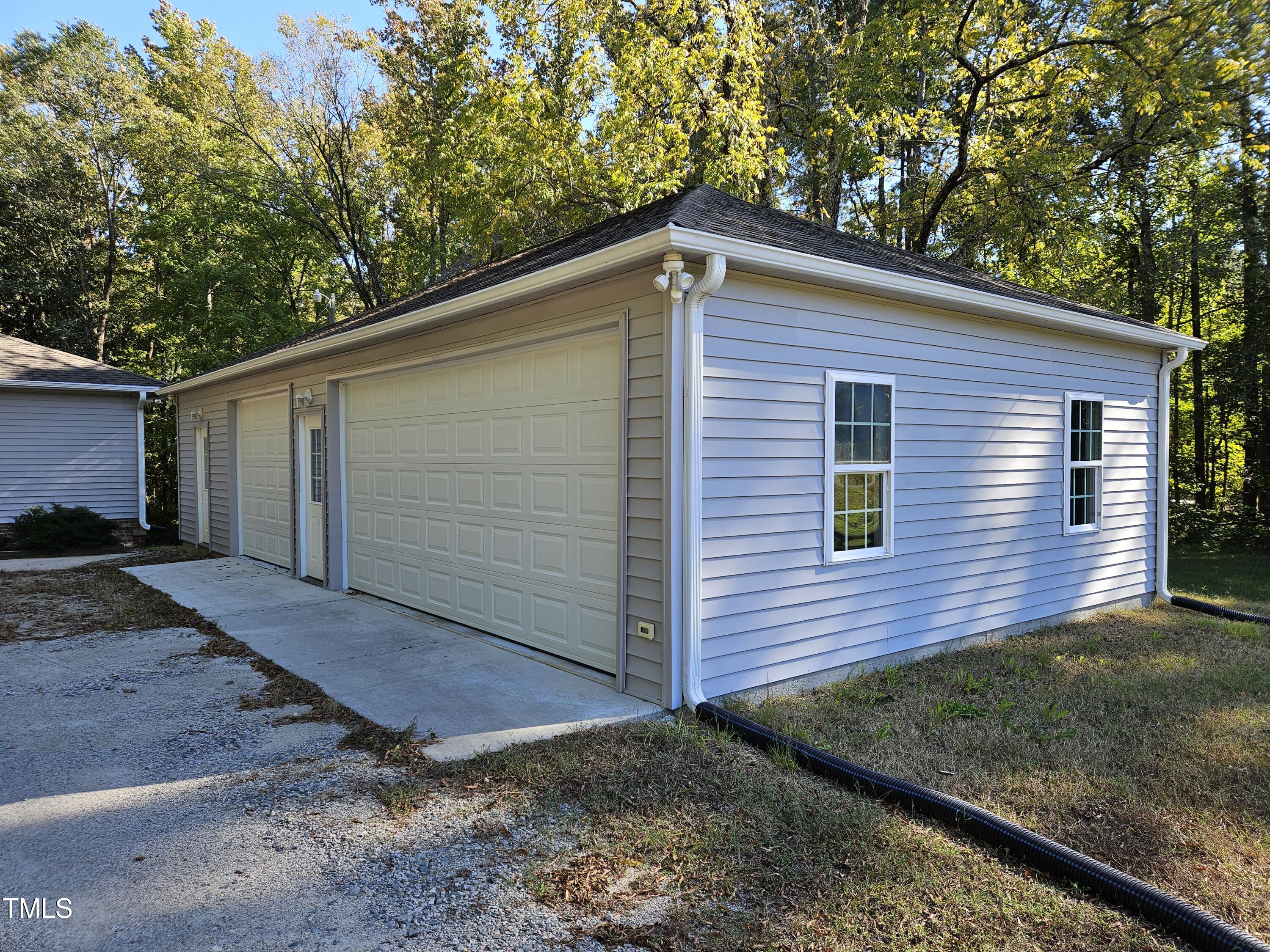 8178 Highway 751 Durham, NC 27713 - Photo 3 of 20 a view of a house with a yard