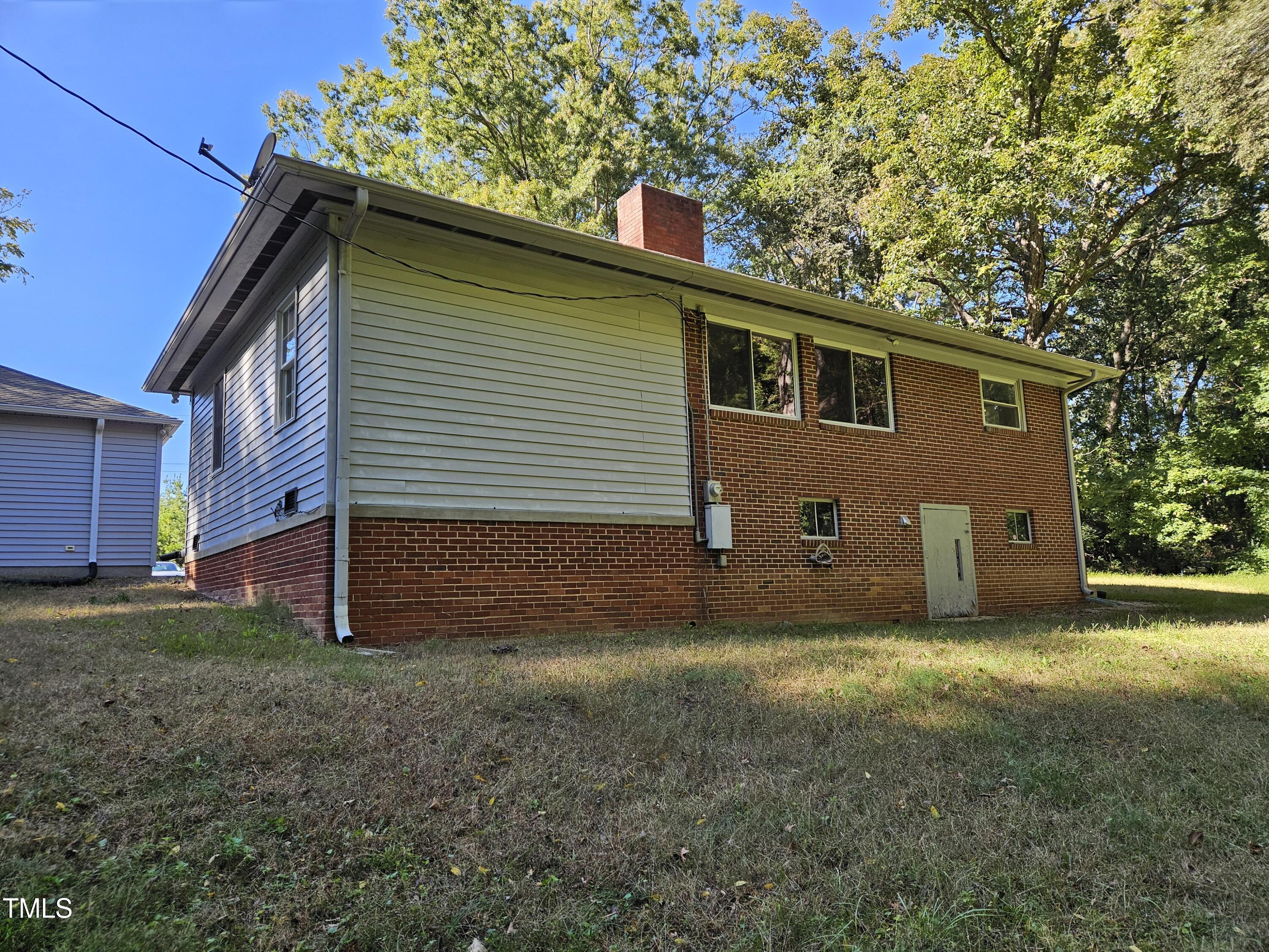8178 Highway 751 Durham, NC 27713 - Photo 4 of 20 a view of a house with a yard