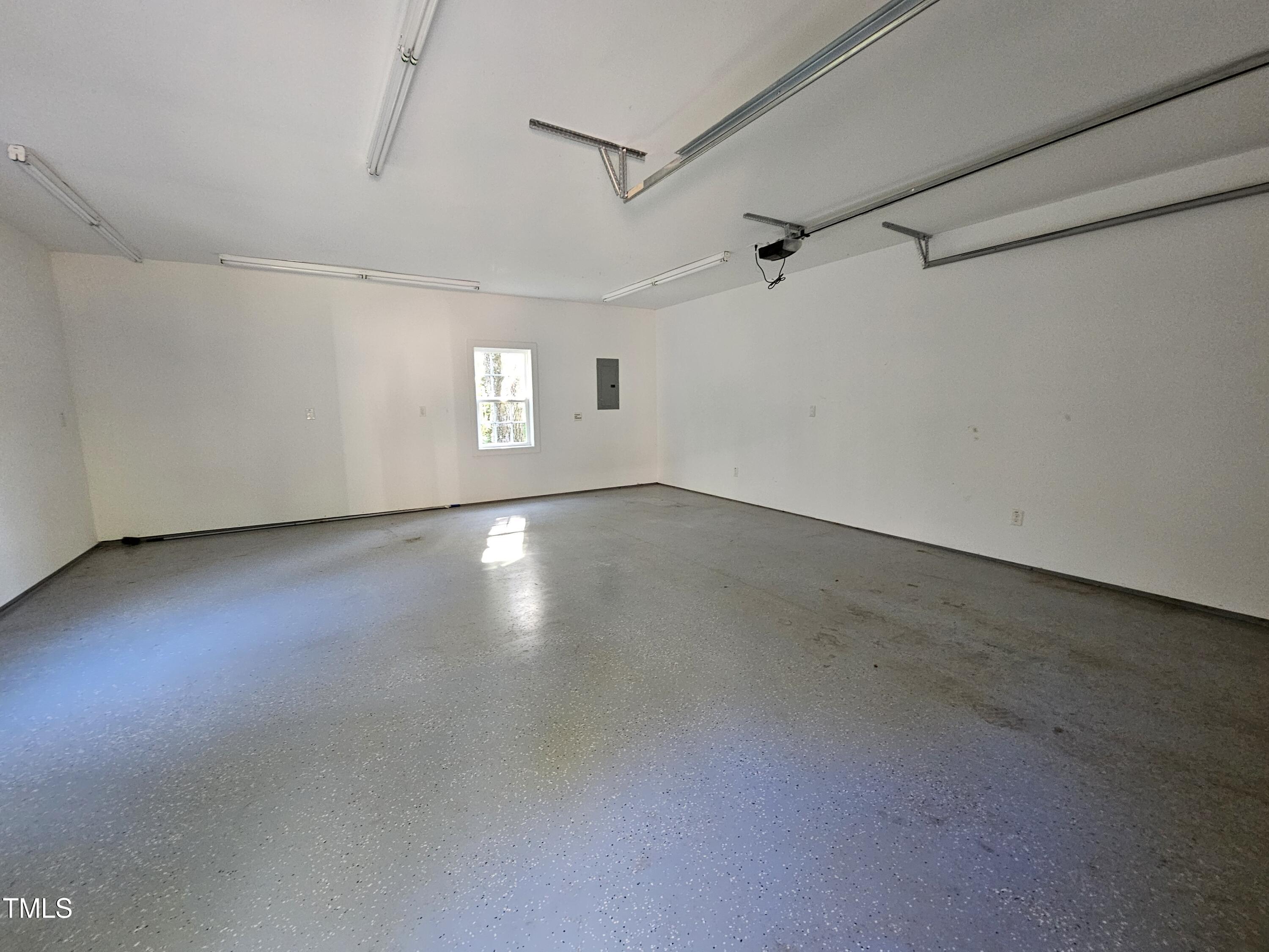 8178 Highway 751 Durham, NC 27713 - Photo 7 of 20 an empty room with windows