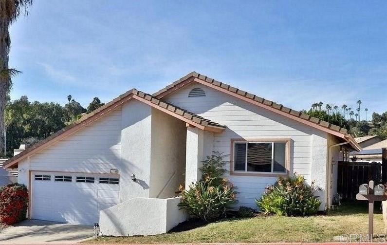 1914 Acorn Glen Escondido, CA 92027 - Photo 1 of 56 a front view of a house with garden