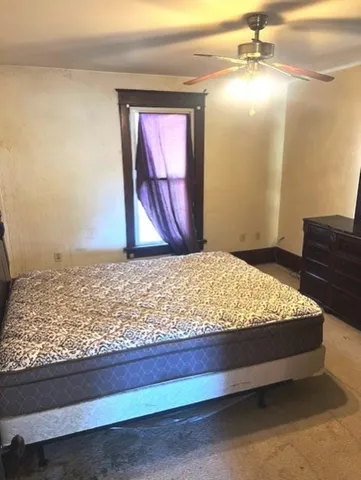 a bedroom with a bed
