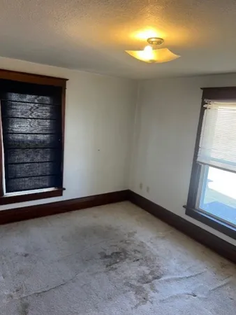 a view of empty room with window