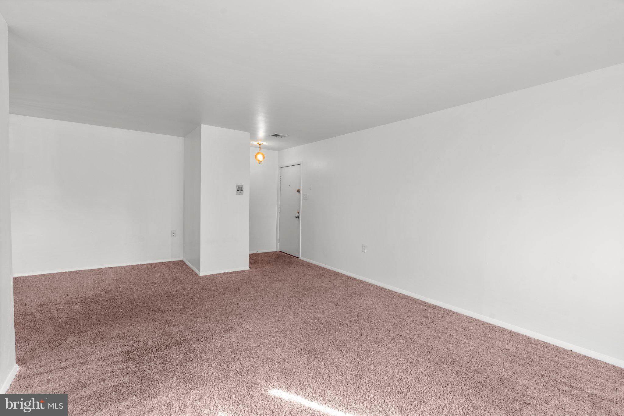 3924 Rolling Rd., Unit B9 Pikesville, MD 21208 - Photo 11 of 25 Living/Dining Room
