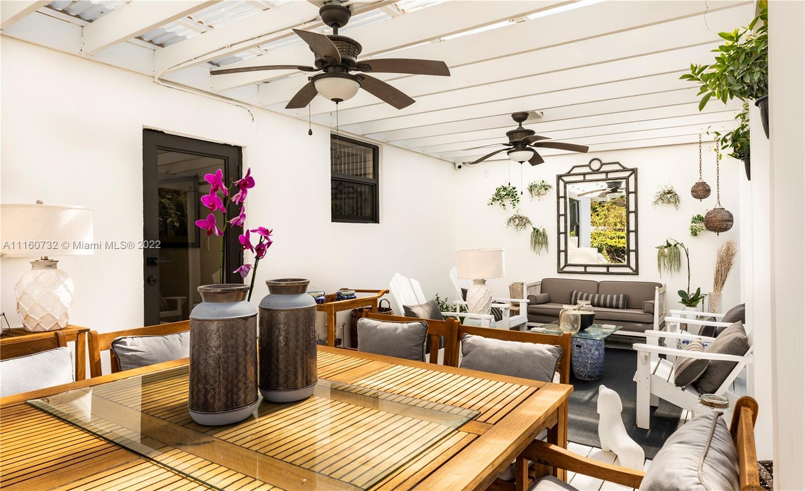 4216 Alton Road Miami Beach, FL 33140 - Photo 21 of 27 a living room with furniture