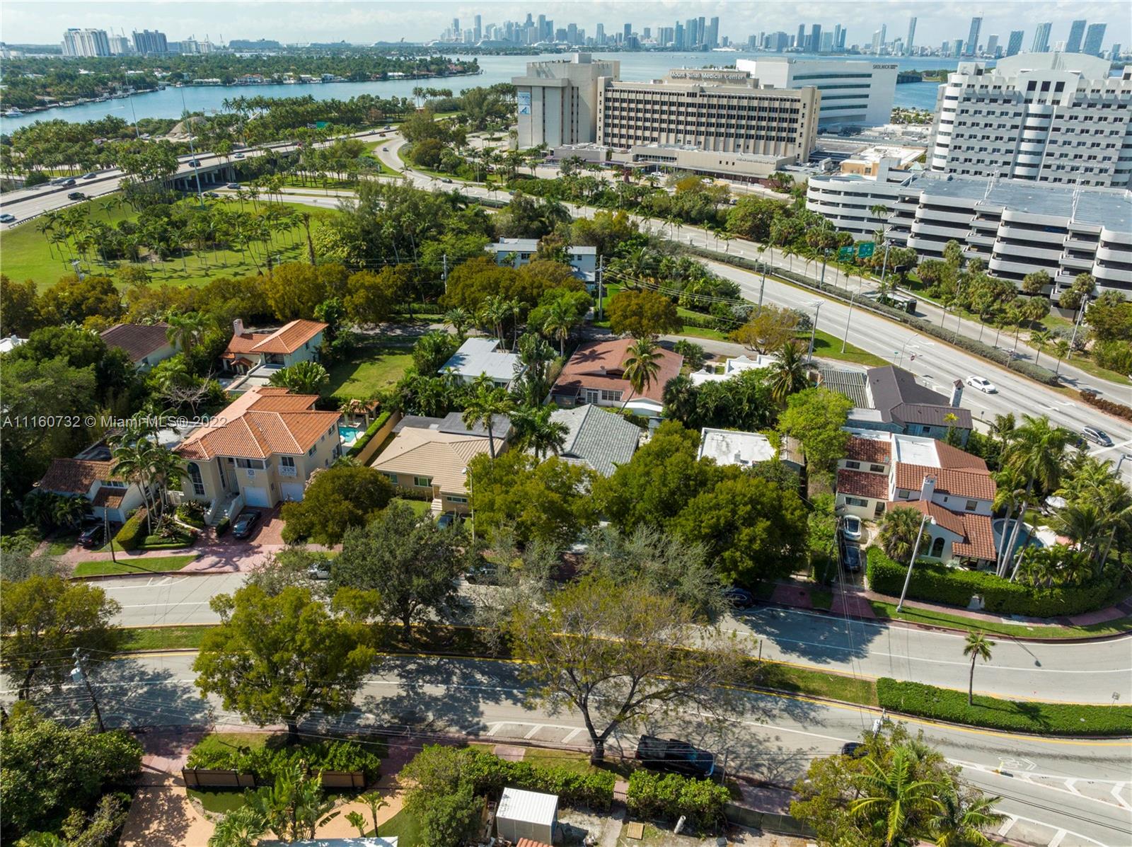4216 Alton Road Miami Beach, FL 33140 - Photo 27 of 27 an aerial view of residential building and lake view