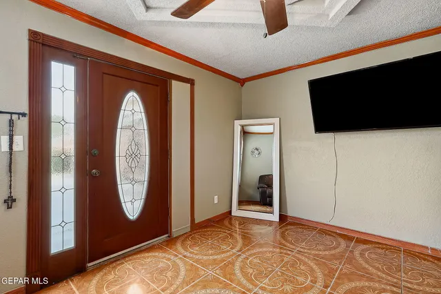 a view of a dining room with furniture and a rug