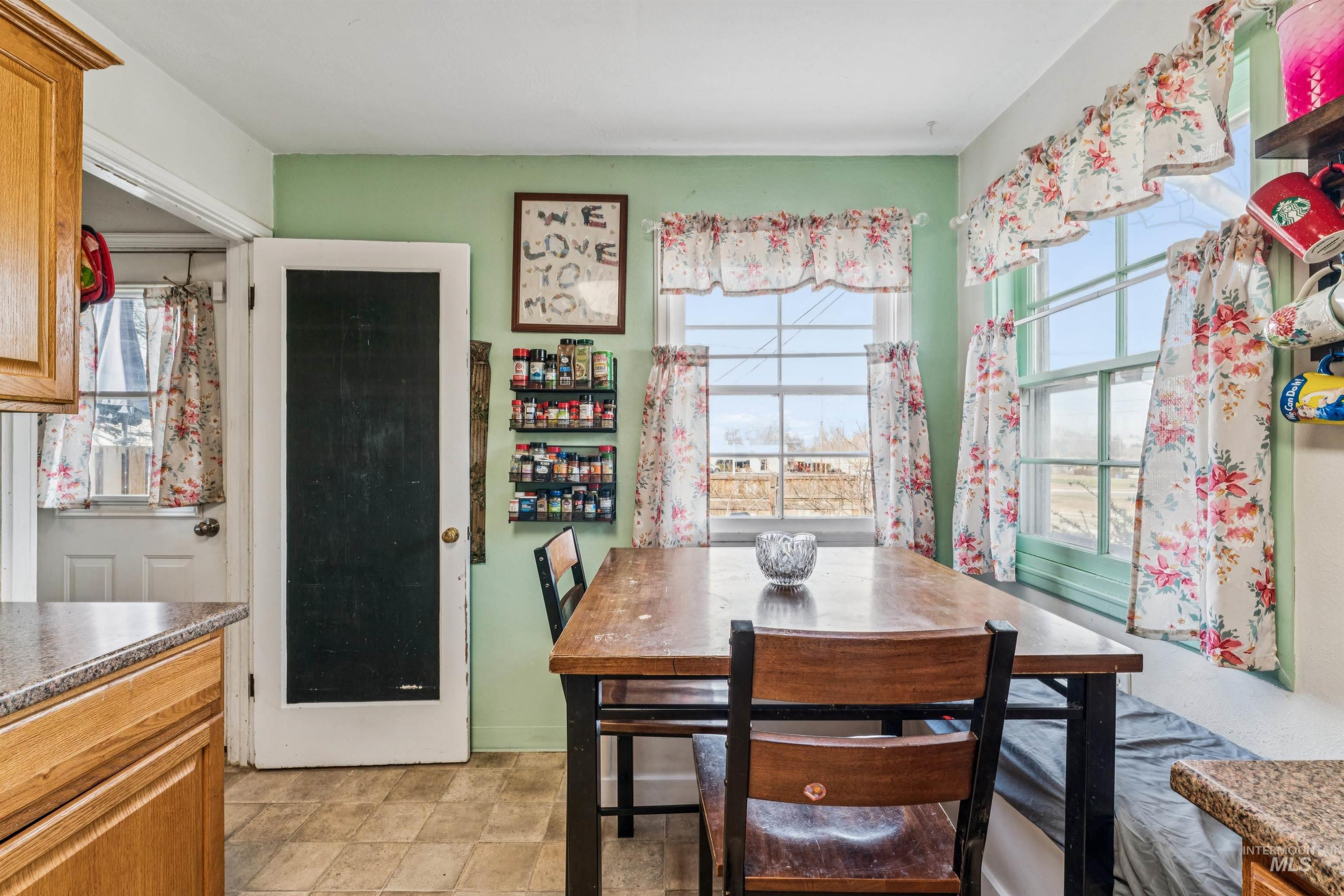 124 Halstead Street Caldwell, ID 83605 - Photo 17 of 42 Dining room featuring plenty of natural light