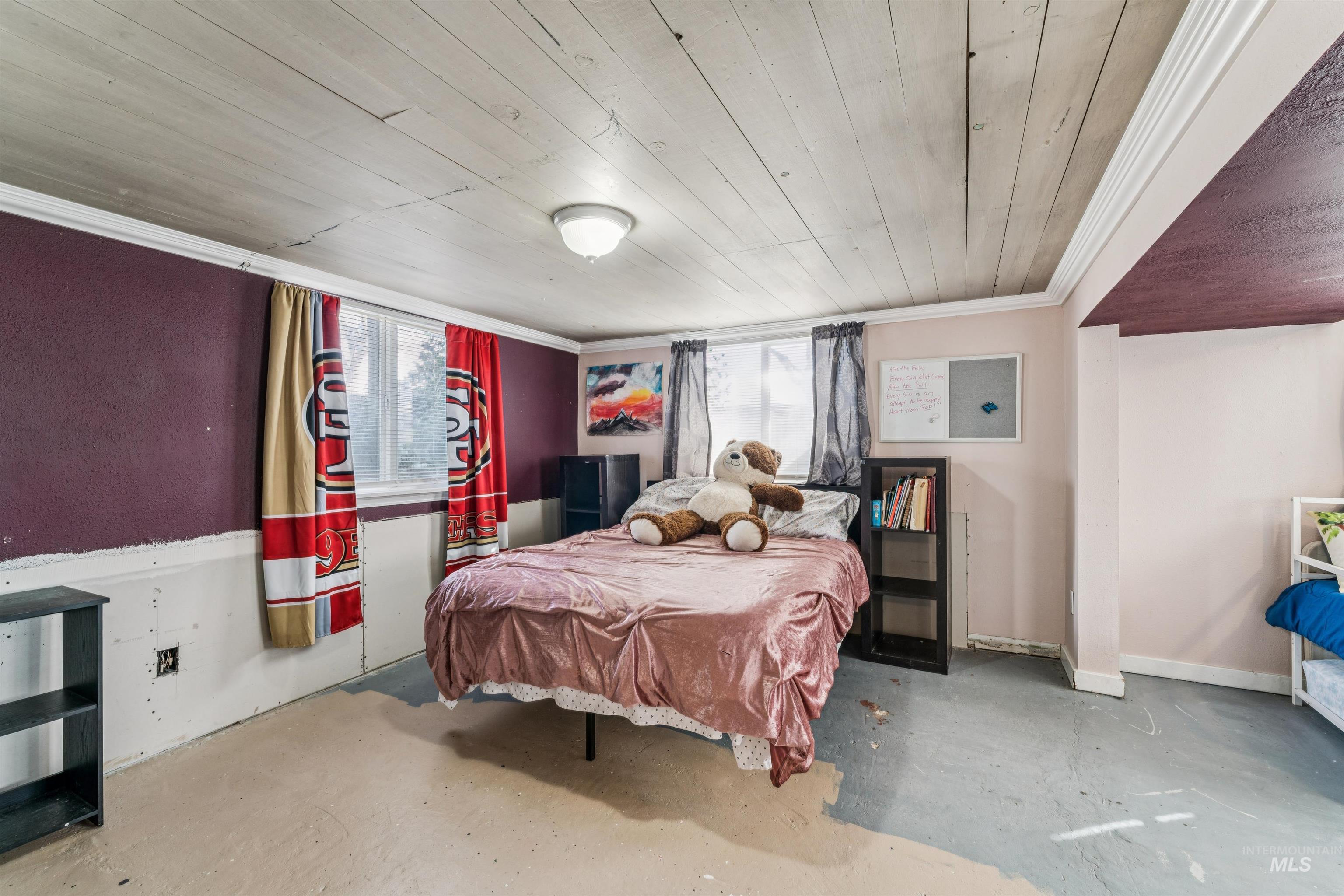 124 Halstead Street Caldwell, ID 83605 - Photo 25 of 42 Bedroom with concrete floors, multiple windows, wood ceiling, and ornamental molding
