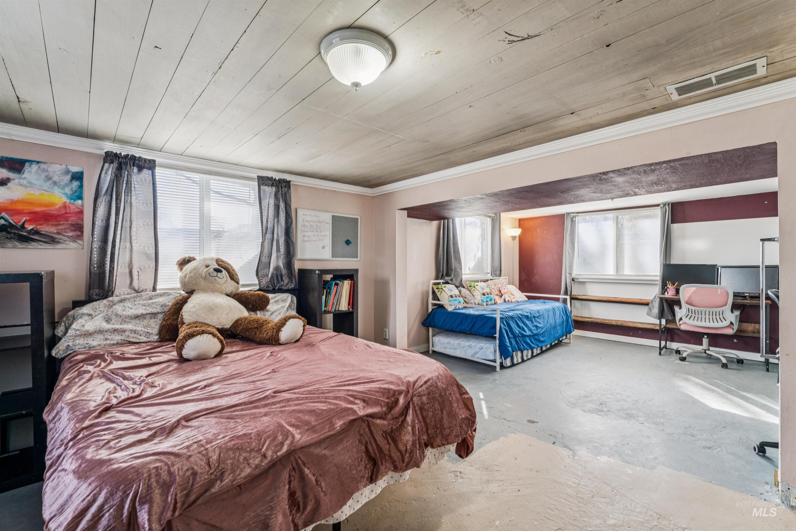 124 Halstead Street Caldwell, ID 83605 - Photo 26 of 42 Bedroom featuring concrete floors, wood ceiling, and ornamental molding
