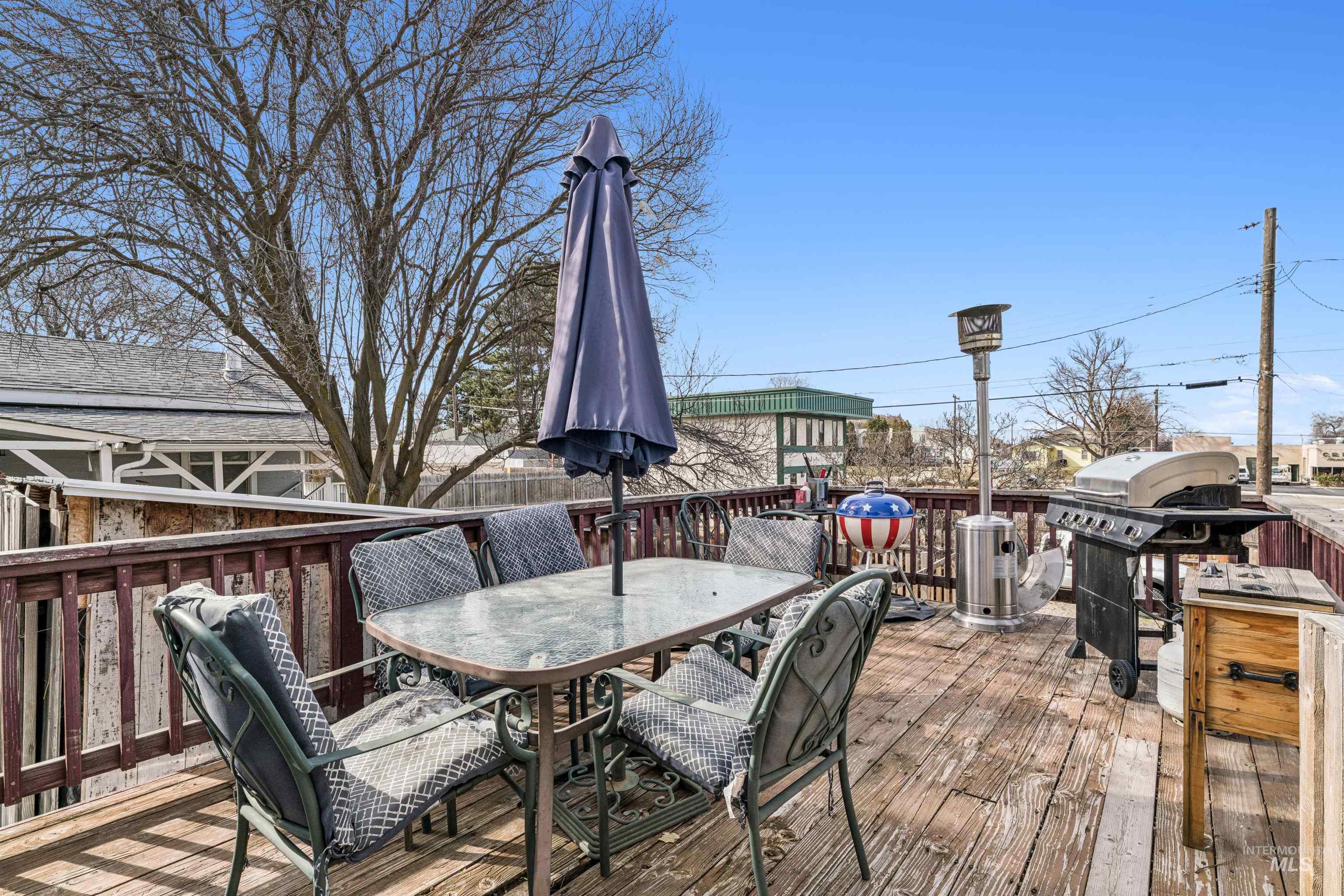 124 Halstead Street Caldwell, ID 83605 - Photo 39 of 42 Deck with outdoor dining space and grilling area