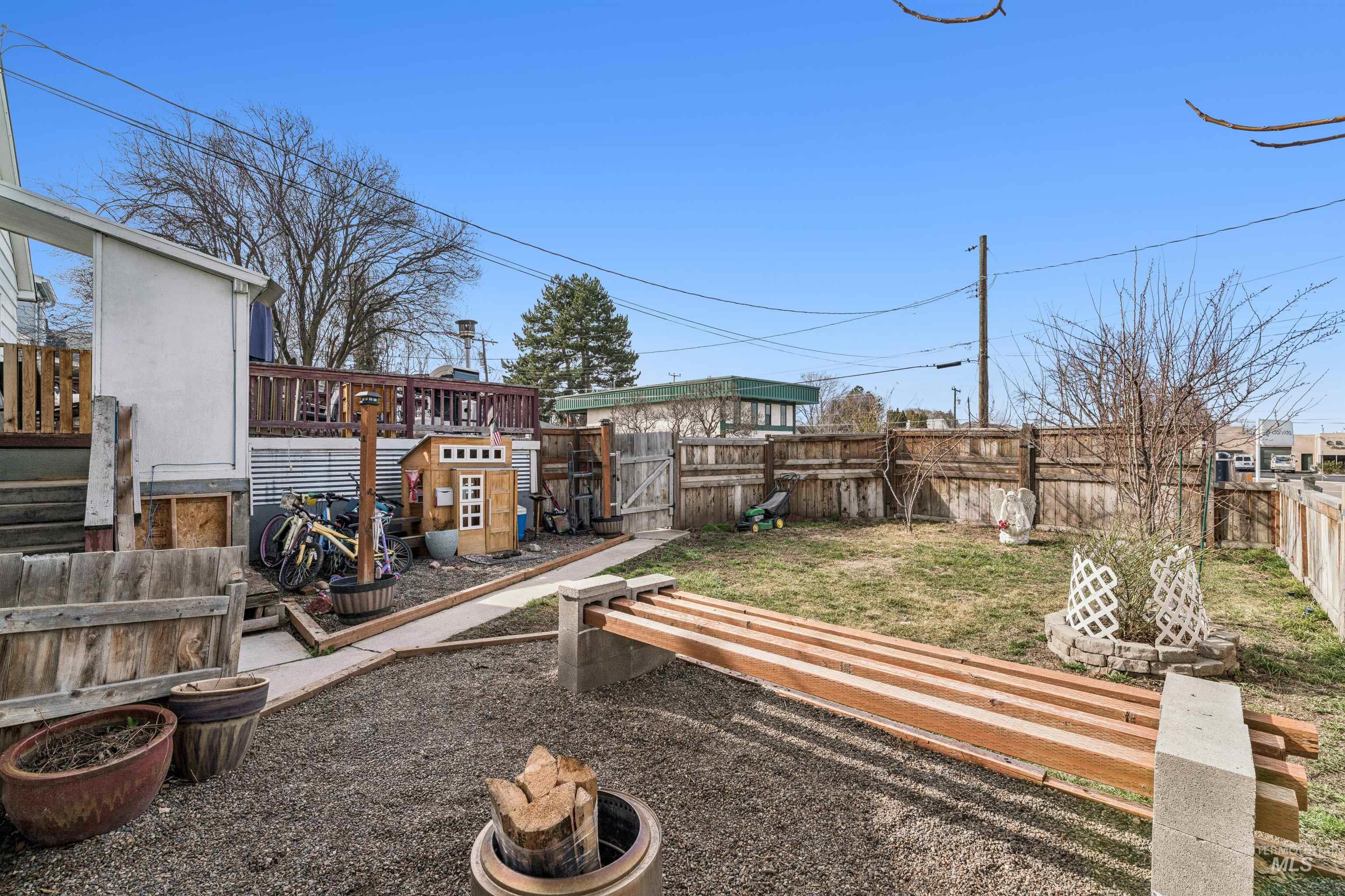 124 Halstead Street Caldwell, ID 83605 - Photo 41 of 42 Fenced backyard with a gate