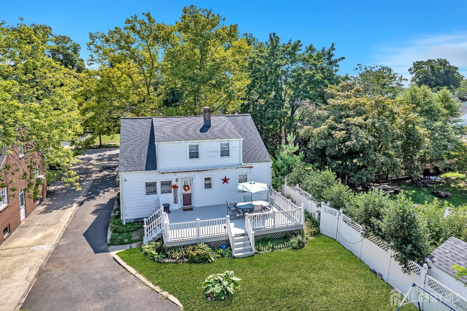 446 2nd Street Dunellen, NJ 08812 - Photo 28 of 31 an aerial view of a house with garden space and a street view