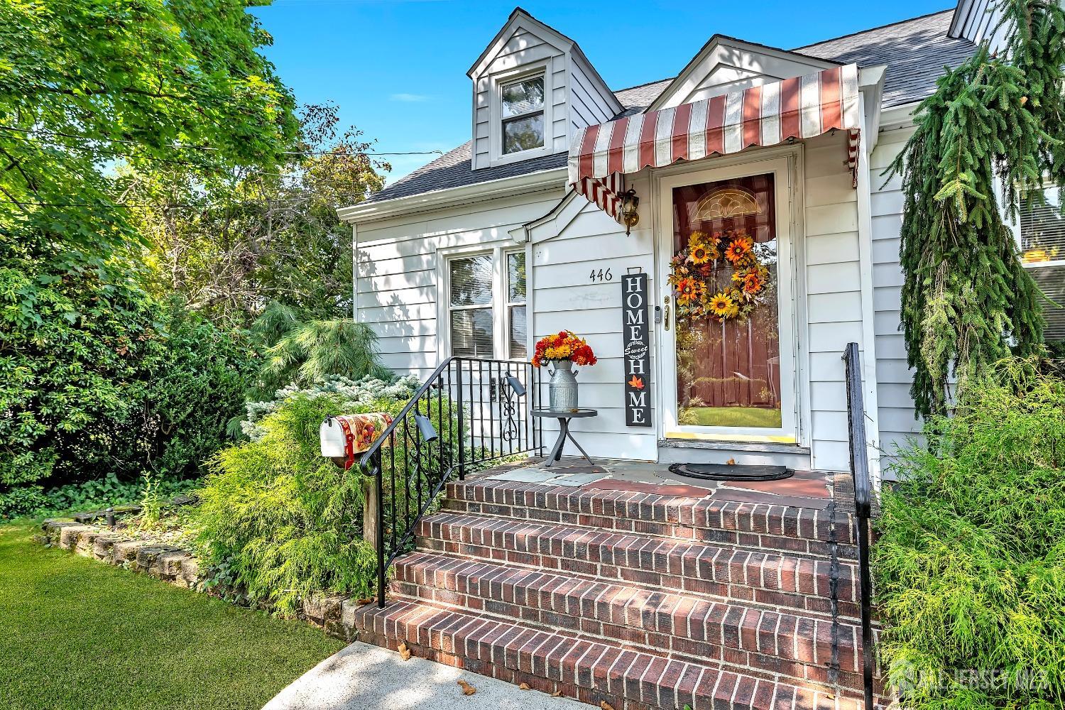 446 2nd Street Dunellen, NJ 08812 - Photo 5 of 31 a front view of a house with garden