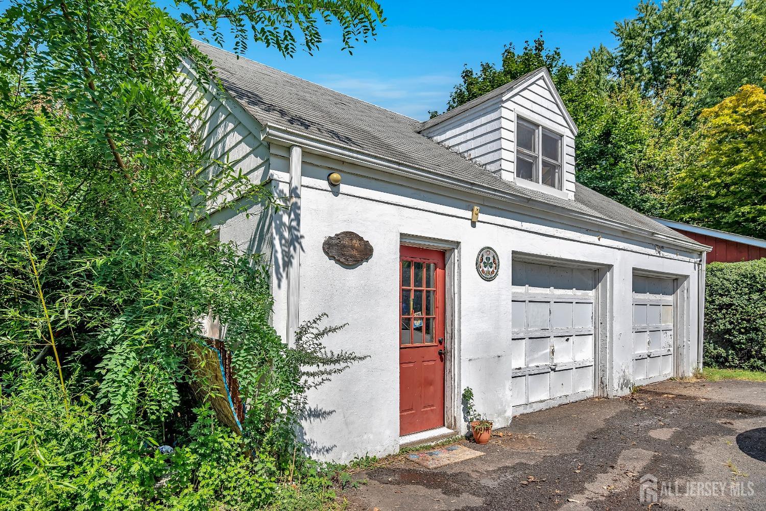 446 2nd Street Dunellen, NJ 08812 - Photo 8 of 31 a front view of a house with a yard