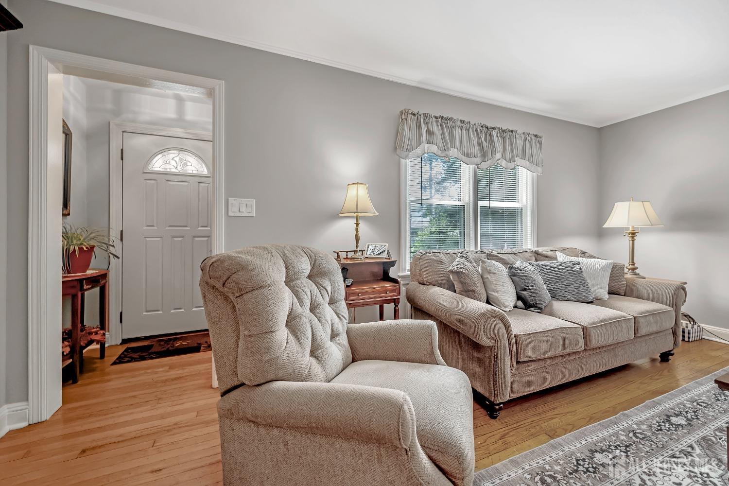 446 2nd Street Dunellen, NJ 08812 - Photo 9 of 31 a living room with furniture and a large window