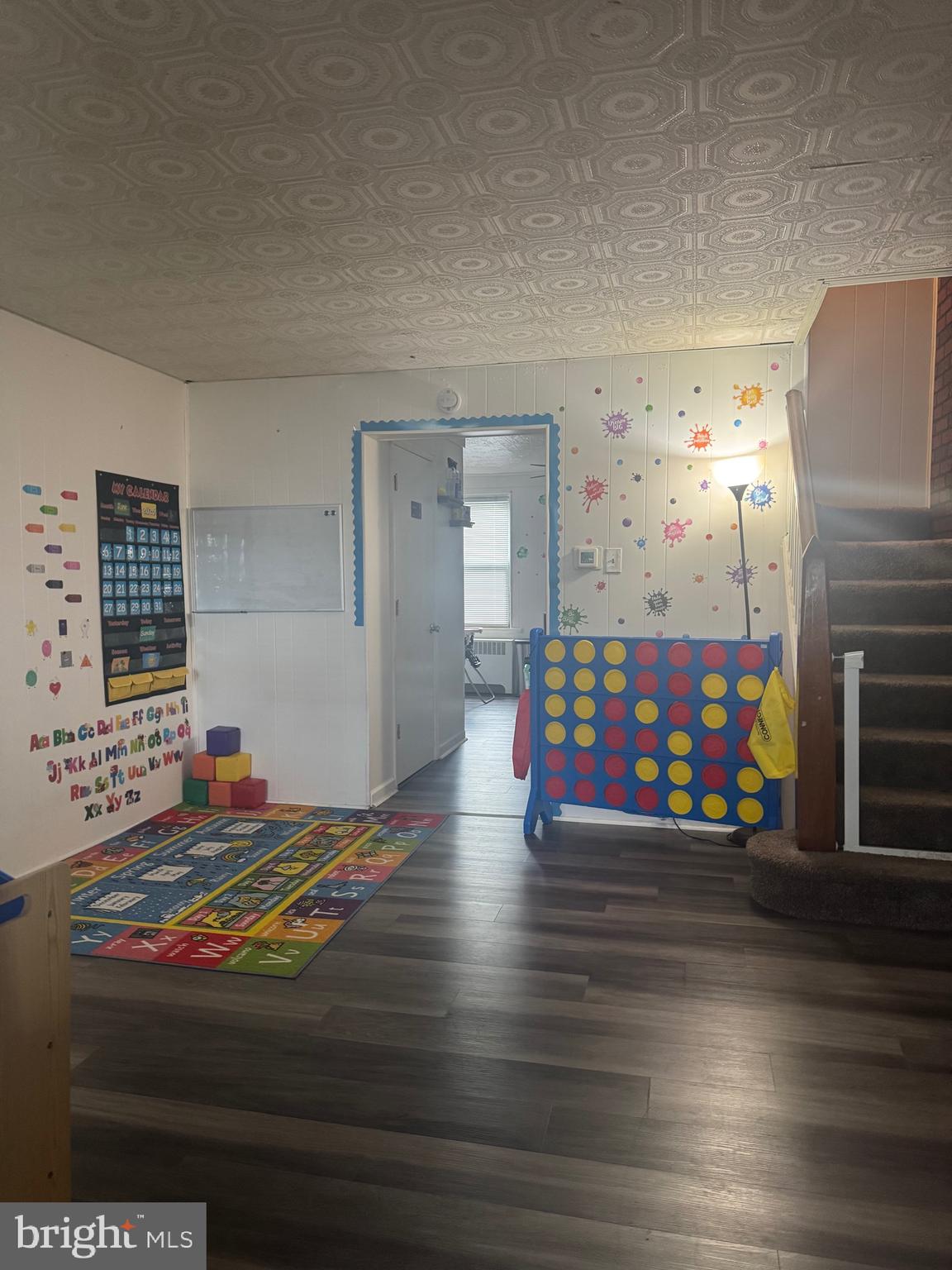 519 3rd Street Lancaster, PA 17603 - Photo 6 of 13 a living room with fireplace furniture and a flat screen tv