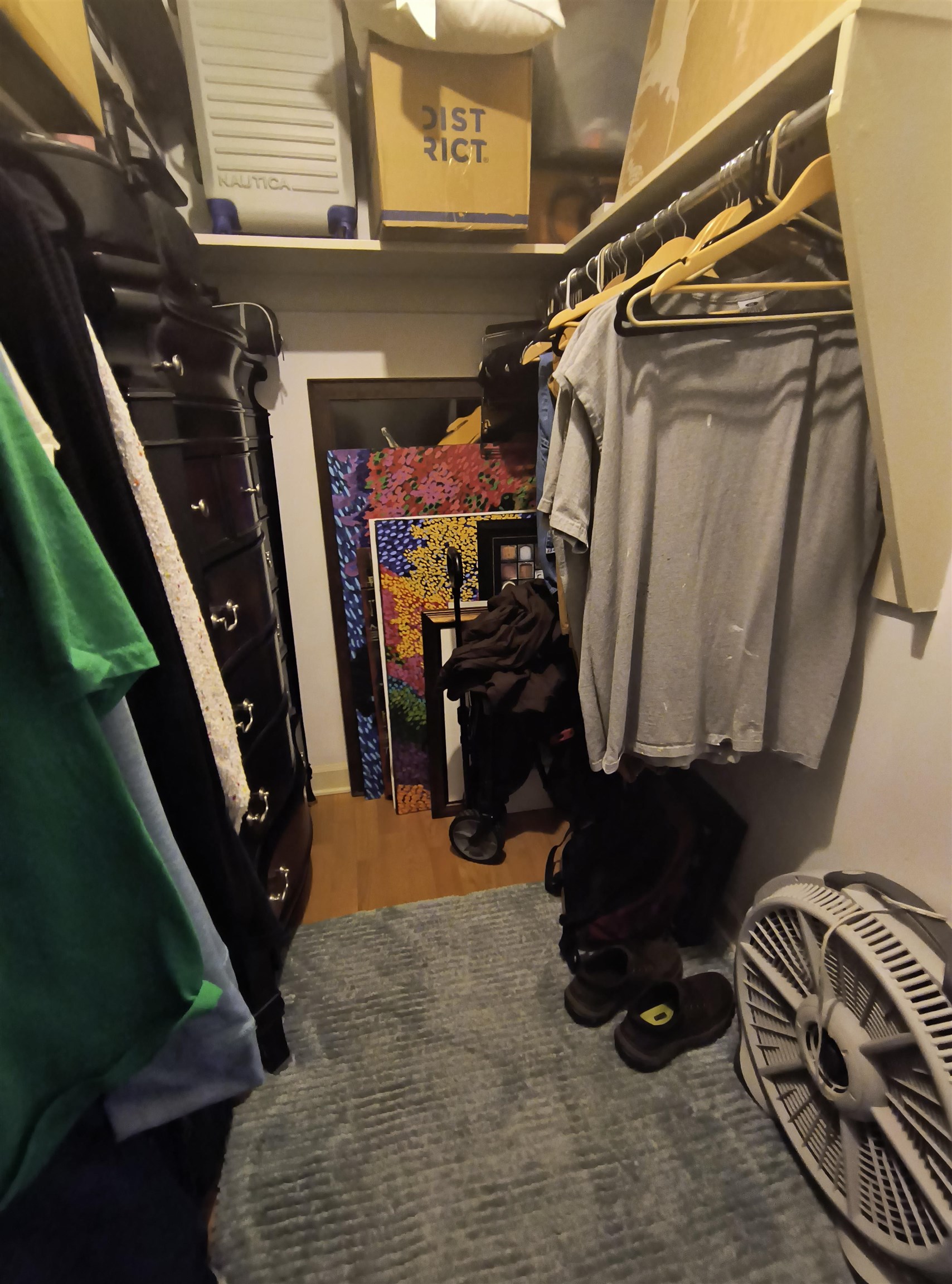 109 North Main Street, Unit 1007 Memphis, TN 38103 - Photo 14 of 18 a view of walk in closet with clothes and shoes