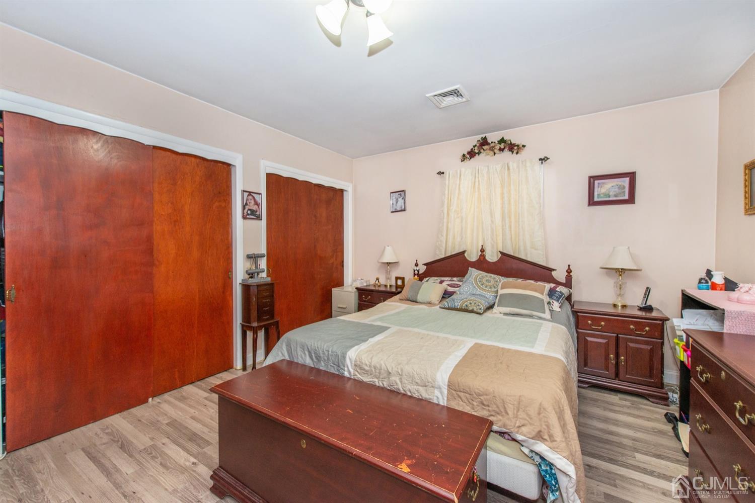104 Highfield Road Colonia, NJ 07067 - Photo 14 of 23 a bedroom with a bed and a closet