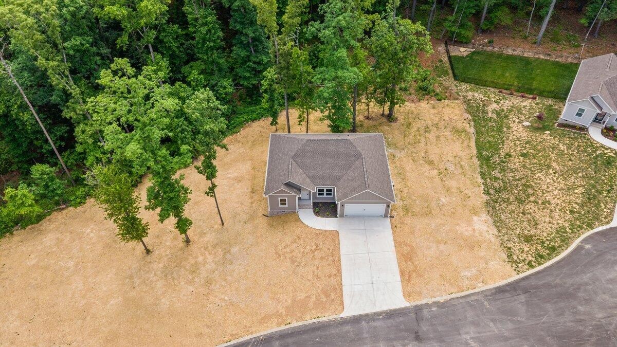 129 County Road 155 Riceville, TN 37370 - Photo 31 of 31 front view of a house with a yard and trees
