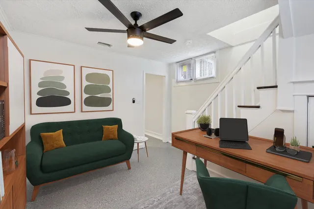 wooden floor in a hall with a window