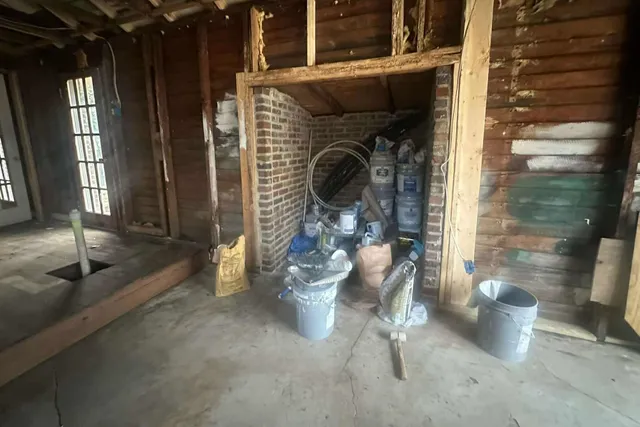 a view of hallway with windows