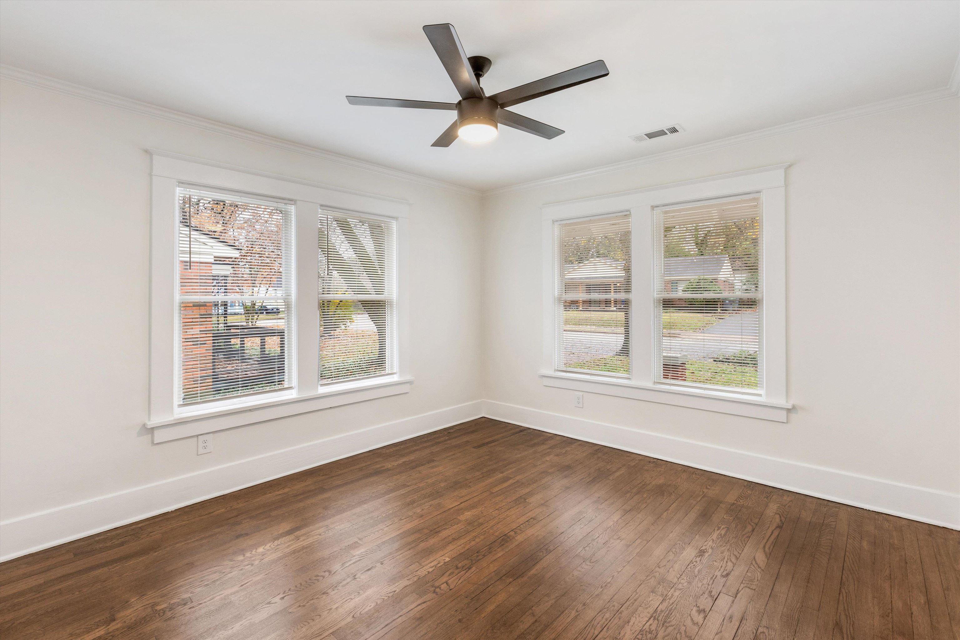 176 Plainview Street Memphis, TN 38111 - Photo 40 of 40 a view of an empty room with wooden floor and a window