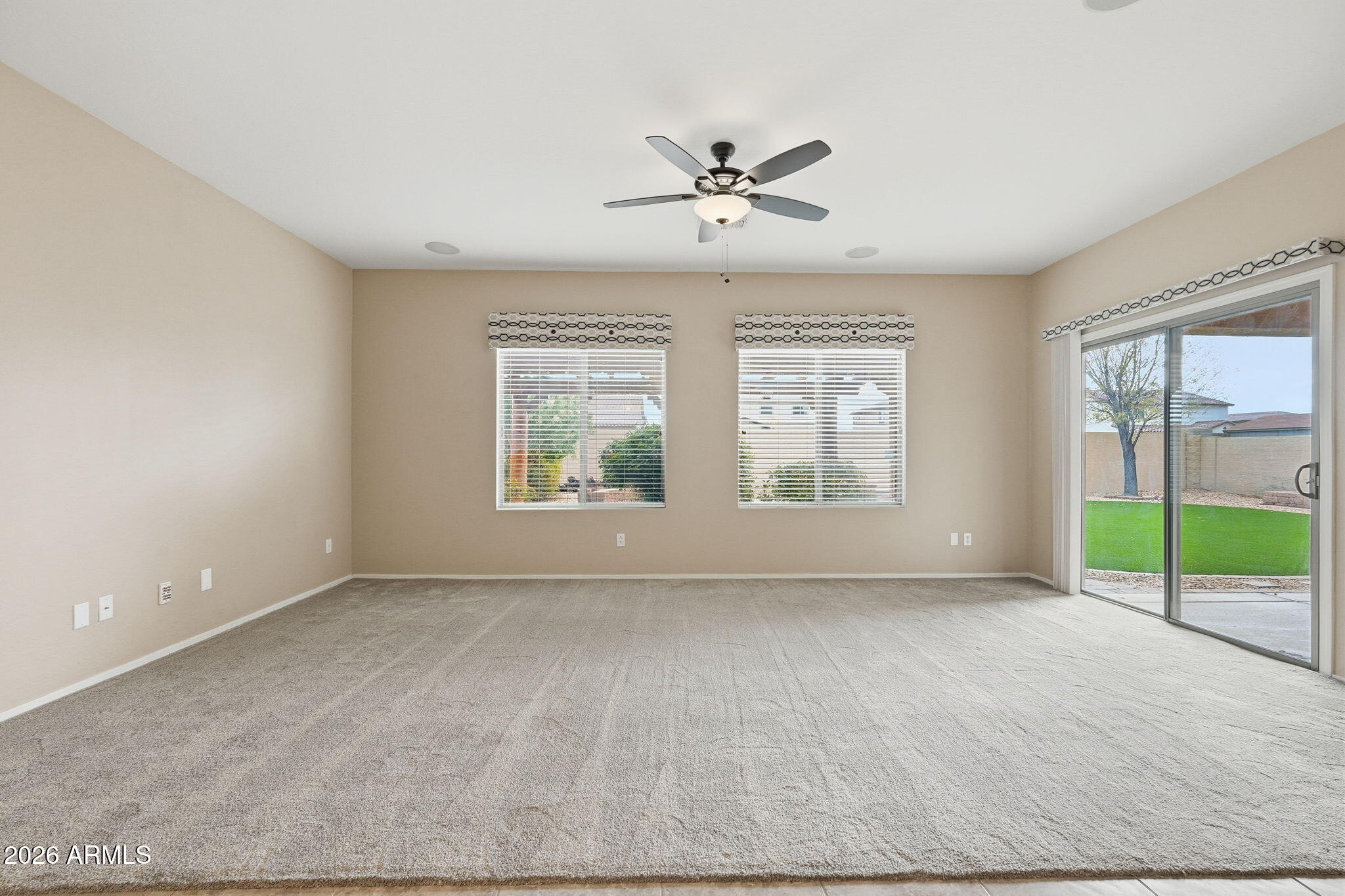 9917 Barley Road Florence, AZ 85132 - Photo 18 of 53 a view of an empty room with a window