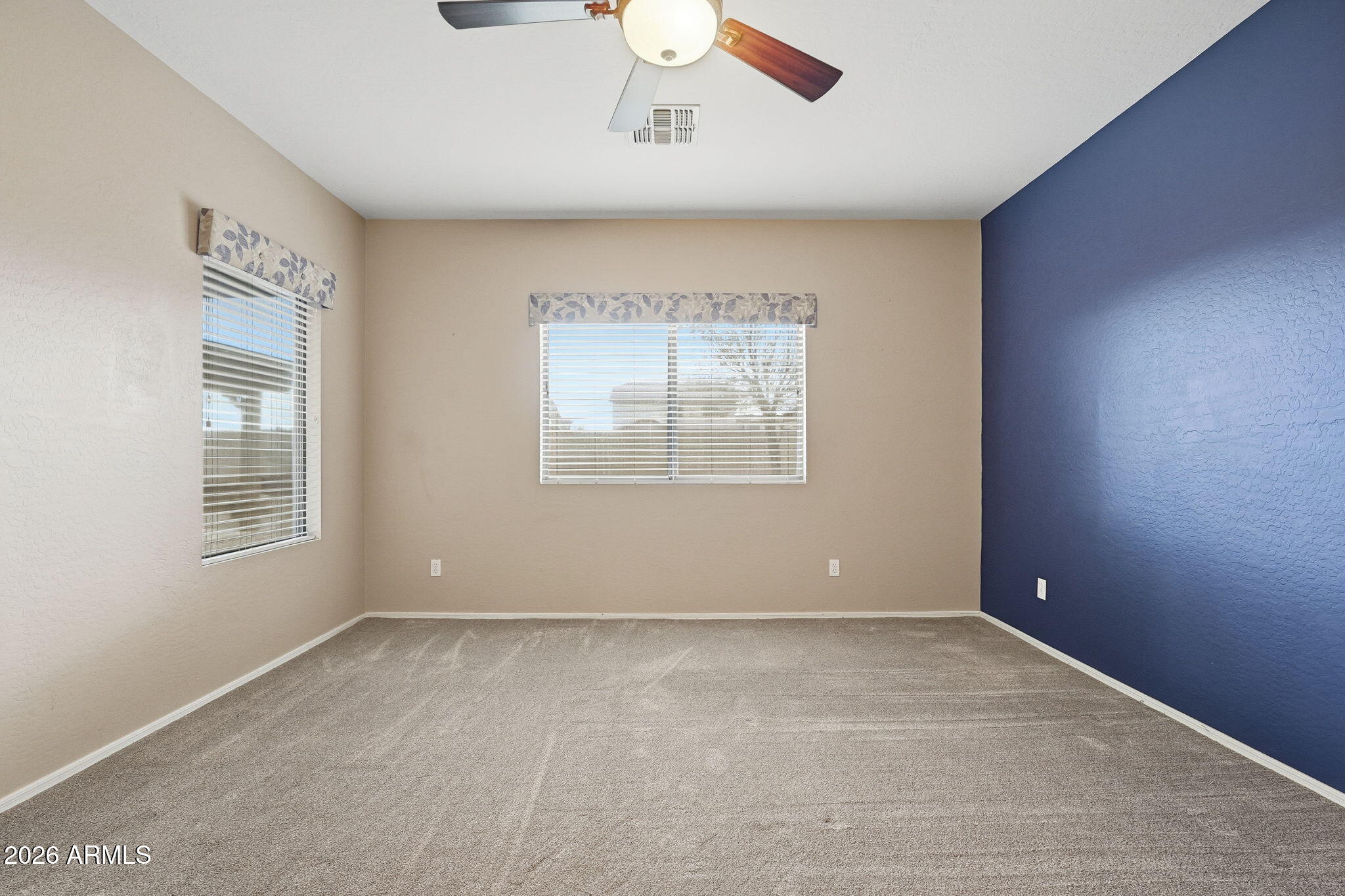 9917 Barley Road Florence, AZ 85132 - Photo 24 of 53 an empty room with windows